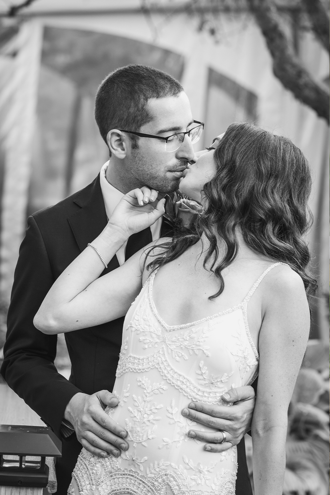 Bride and groom wedding portrait, couple portrait, cute pose, cute couple pose, cute bride and groom pose, kiss, black and white, classy wedding ceremony at Landerhaven, Mayfield Heights OH