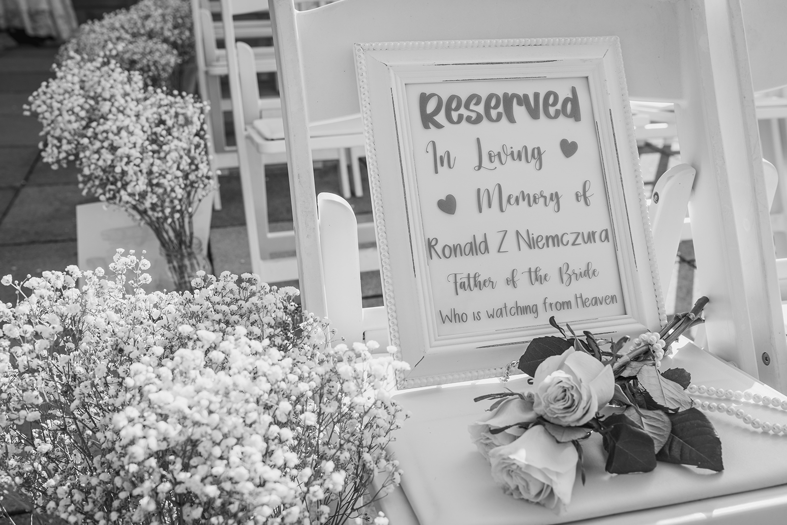Wedding ceremony, reserved seat, memorial sign, memorial seat, flowers, sweet, cute, black and white, outdoor September wedding ceremony at Punderson Manor Lodge & Conference Center, Newbury Township OH