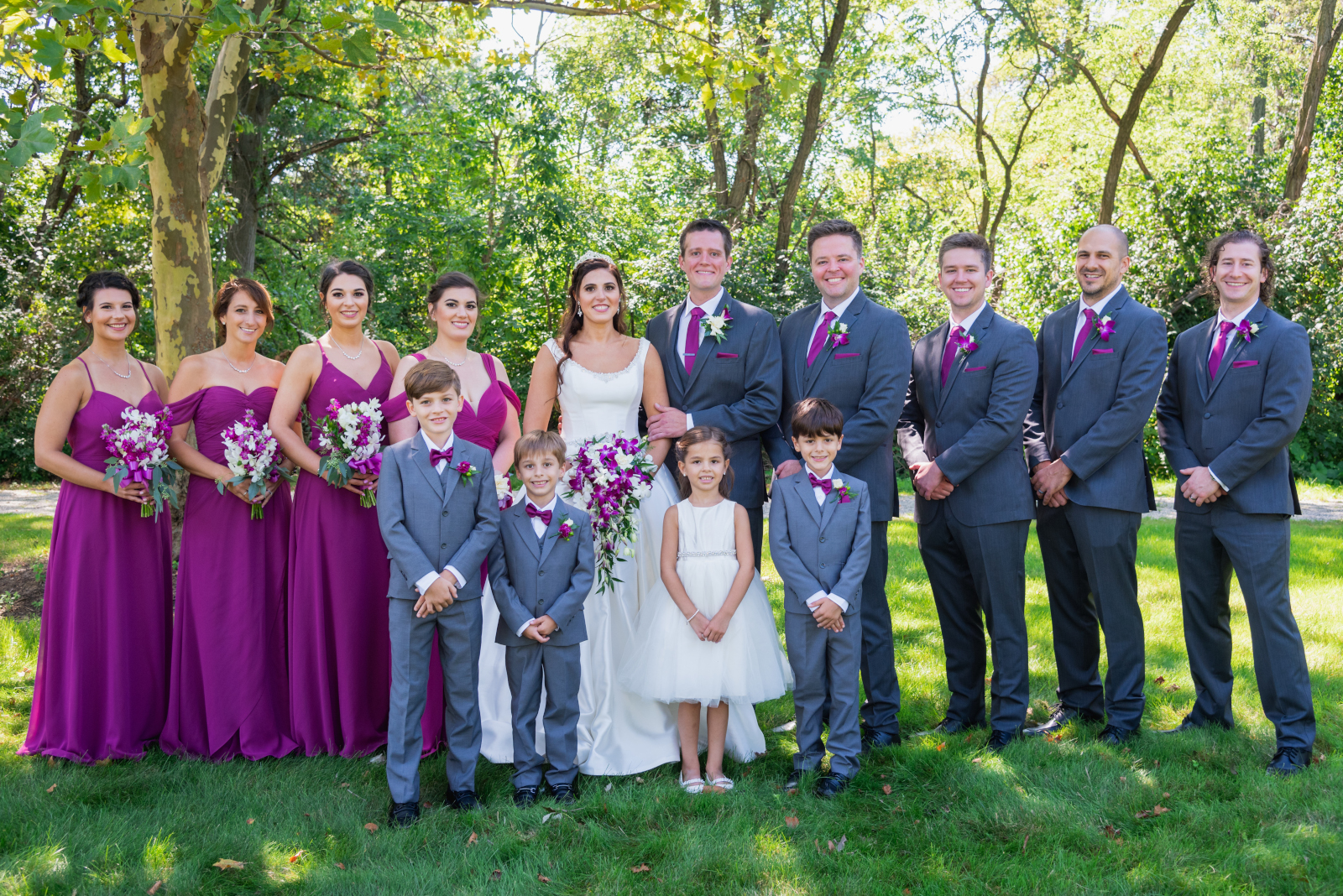 Bride and groom with bridal party, bridal party portrait, green, trees, nature, sweet wedding ceremony at Crocker Park, Westlake OH