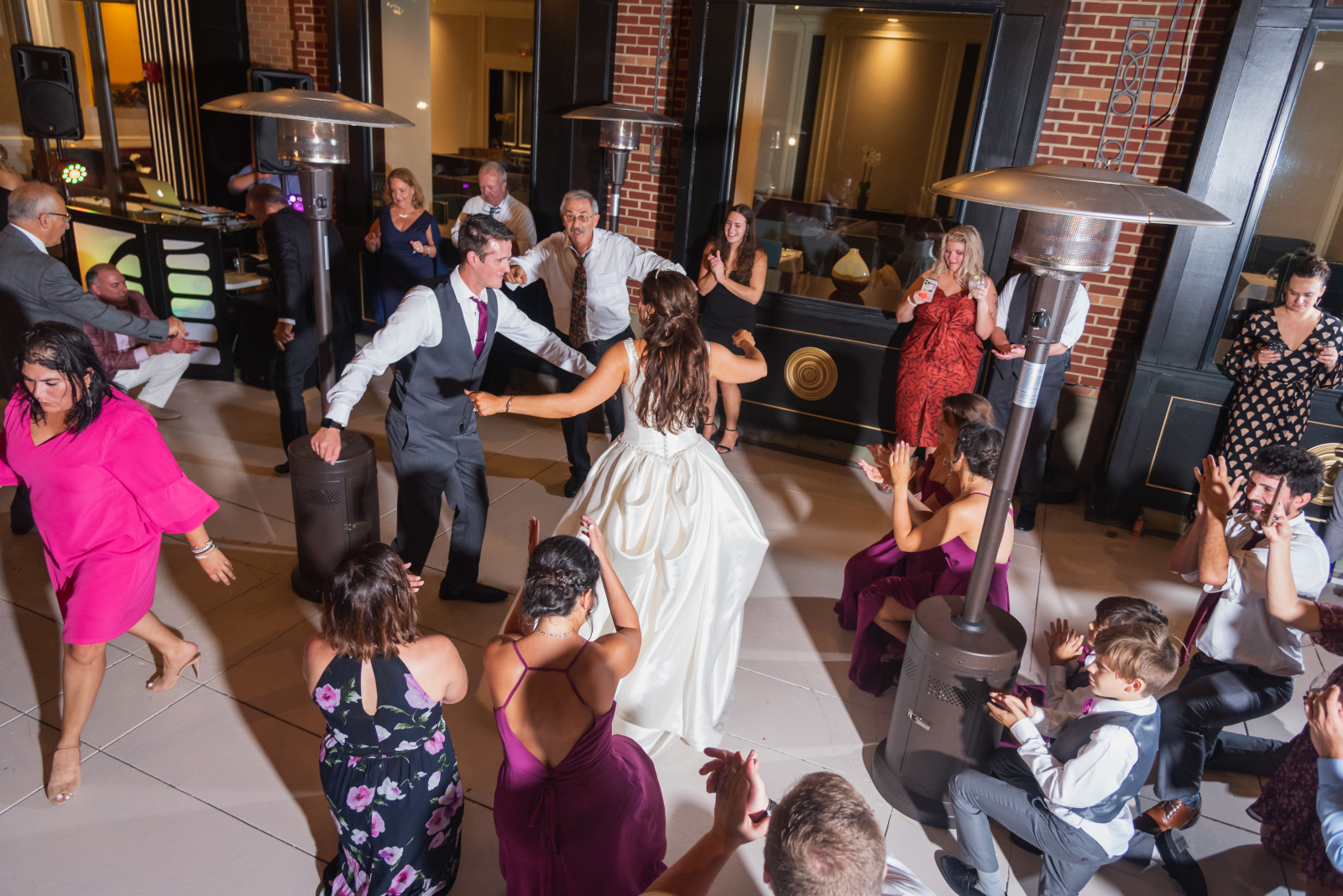 Bride and groom dancing, fun, music, wedding DJ, Sound Precision Entertainment, candid, sweet wedding reception at Crocker Park, Westlake OH