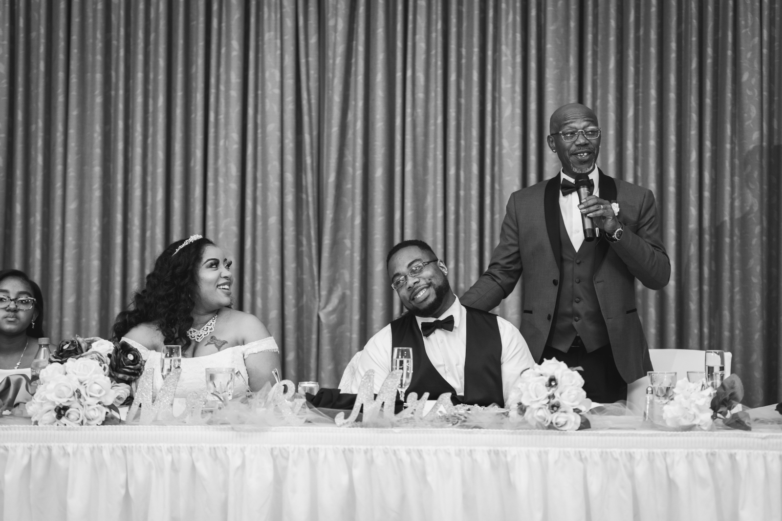 Wedding speech, wedding toast, father of the groom wedding speech, bride and groom laughing, classic wedding photo, black and white, beautiful couple, African American bride, African American wedding, romantic wedding reception at Hilton Akron/Fairlawn