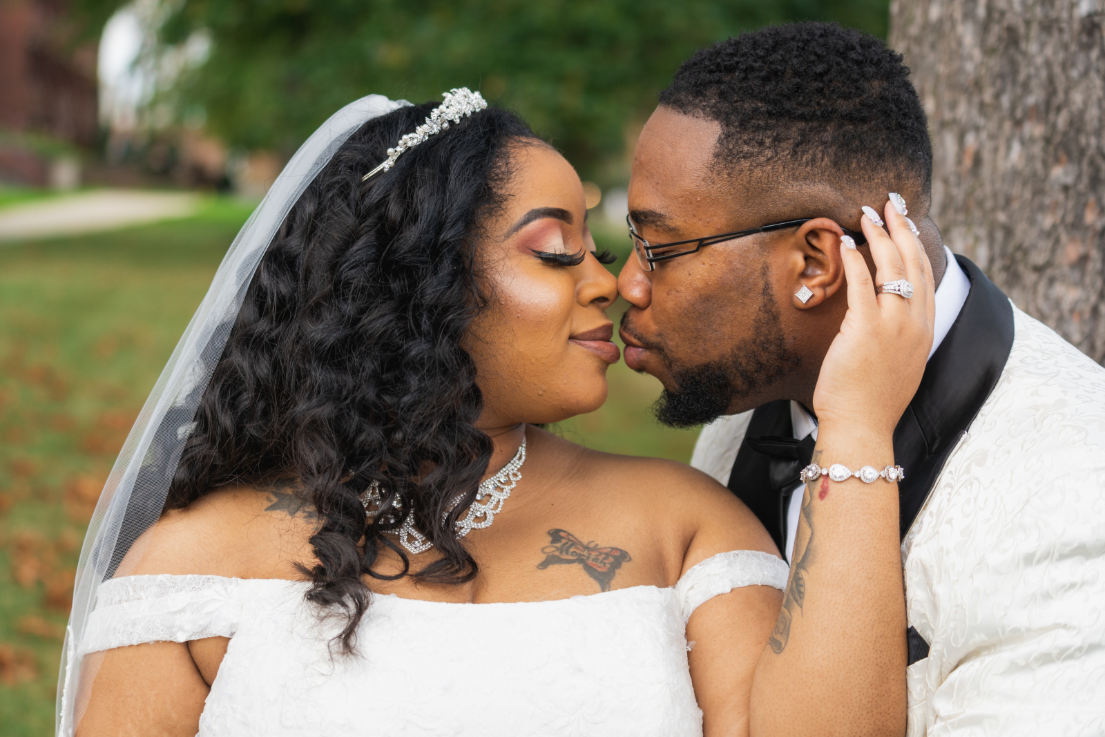 Bride and groom wedding portrait, cute, romantic, outdoor, nature, tree, beautiful African American bride, African American wedding, romantic wedding ceremony at Hilton Akron/Fairlawn