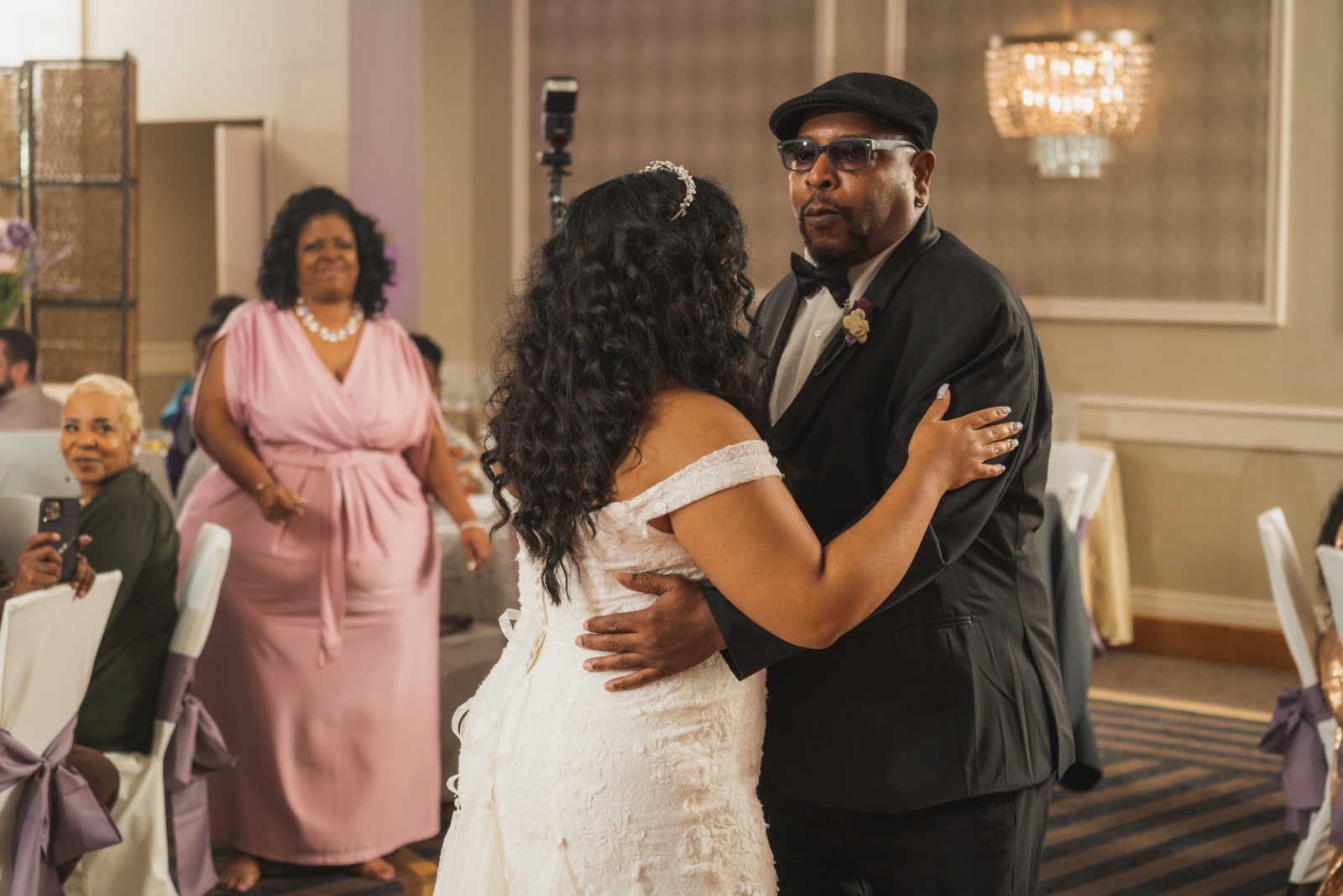 Bride and father, father daughter dance, proud mom in background, sweet wedding photo, beautiful African American bride, African American wedding, romantic wedding reception at Hilton Akron/Fairlawn