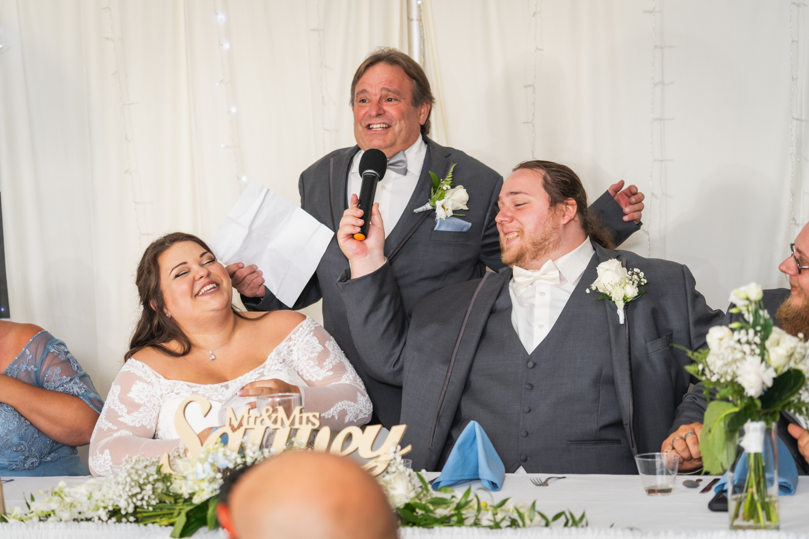 Father of the bride speech, wedding speech, wedding toast, bride and groom laughing, head table, September wedding reception at Westfall Event Center