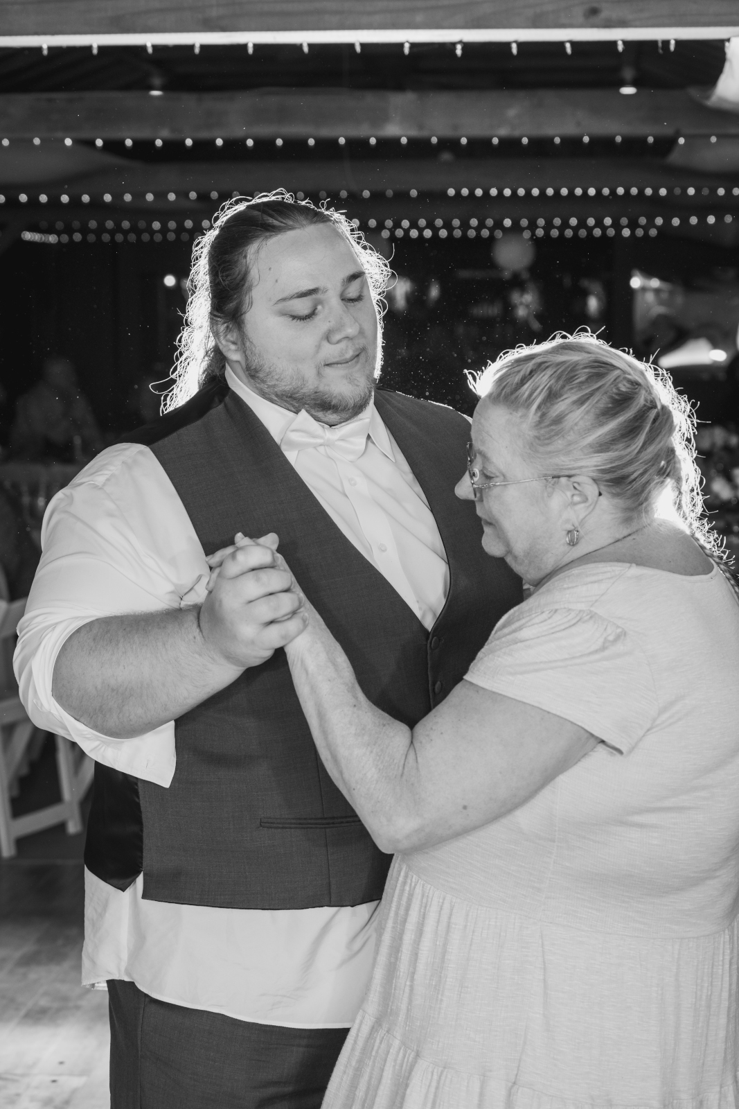 Groom and mom, mother of the groom, mother groom dance, wedding formal dance, sweet, black and white, September wedding reception at Westfall Event Center