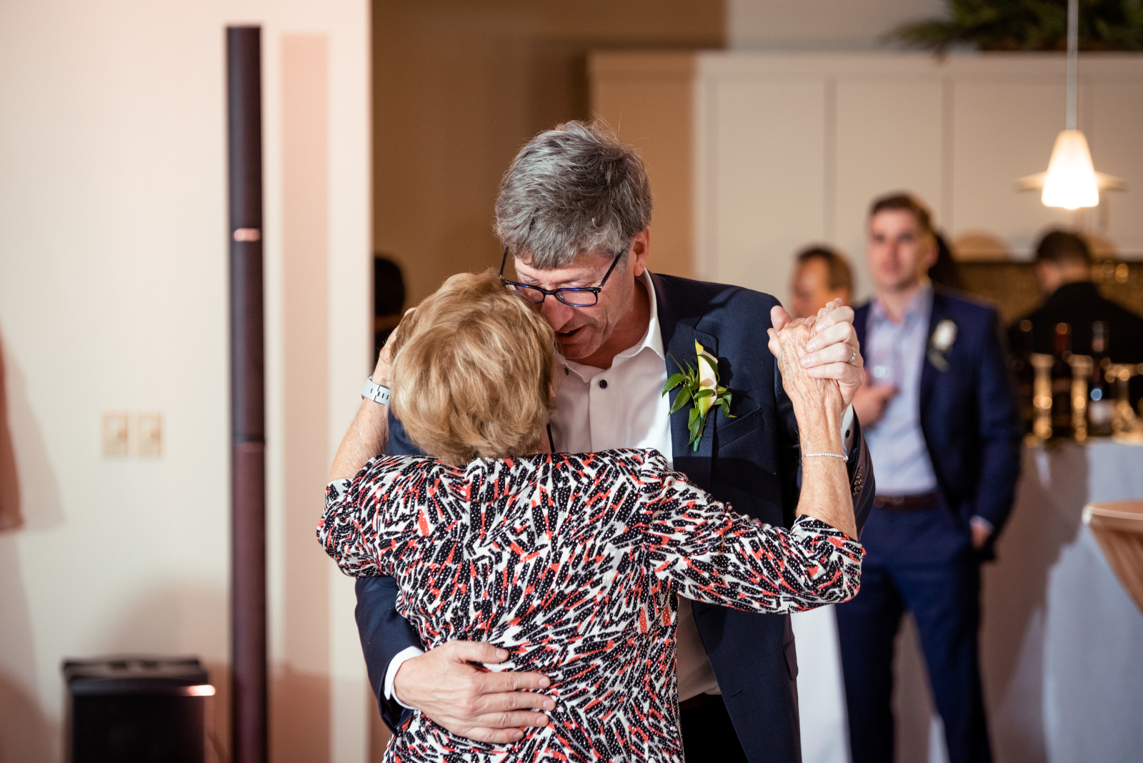 Groom with mom, mother groom dance, formal wedding dance, slow dance, smiling, laughing, classic wedding photo, older couple, cute, sweet, romantic urban wedding reception at Penthouse Events, Ohio City, Cleveland Flats