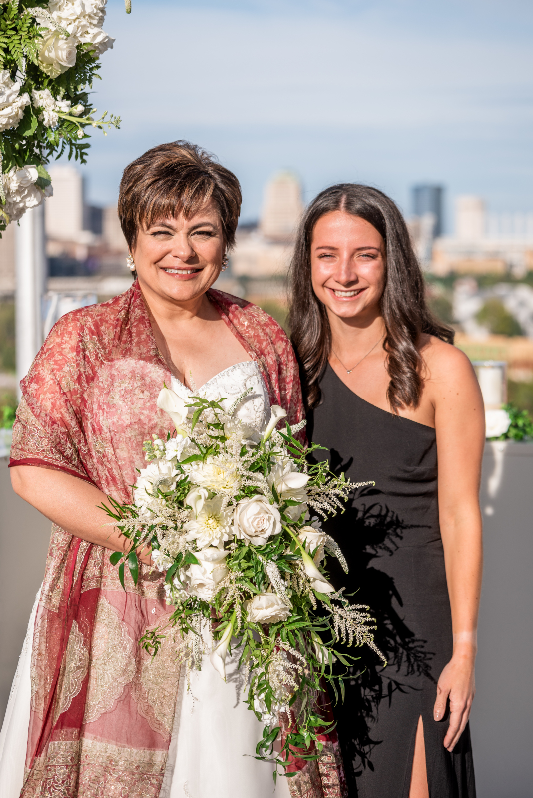 Bride with daughter, small bridal party, bridal party portrait, older couple, romantic outdoor urban wedding ceremony at Penthouse Events, Ohio City, Cleveland Flats, downtown Cleveland skyline