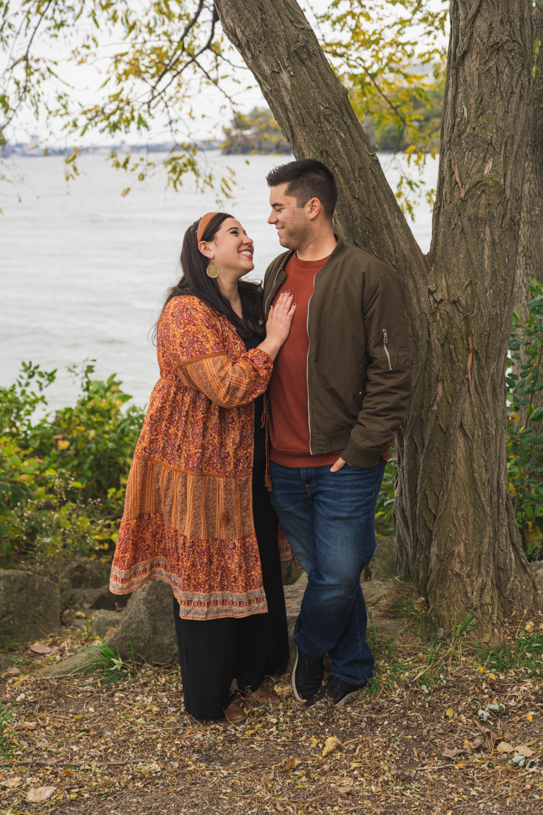 Man and woman fiancee engagement photo, outdoor fall engagement photo session at Lakewood Park