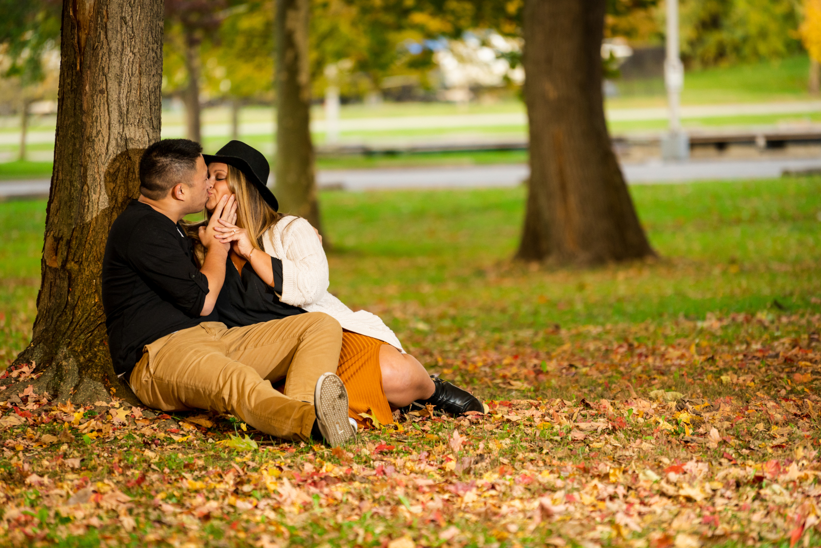 Man and woman fiancee engagement photo, outdoor fall engagement photo session at Rocky River Reservation, Cleveland Metroparks