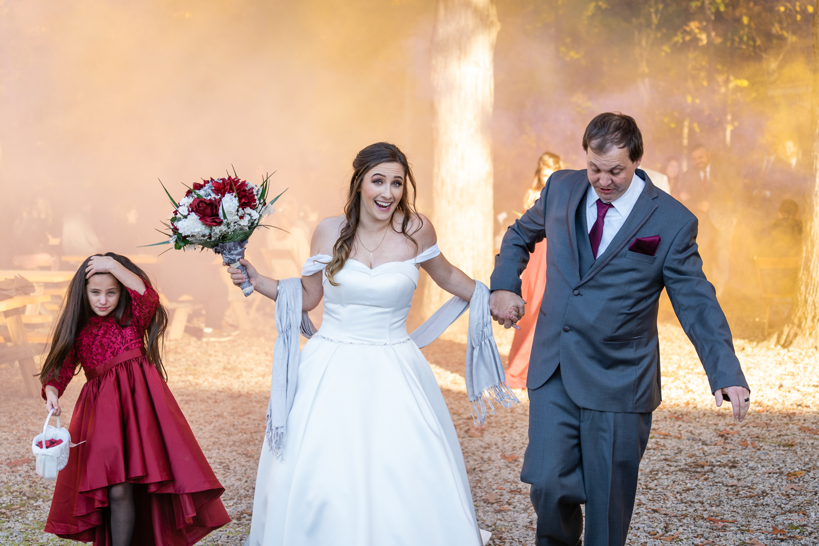 Bride and groom recessional, smoke effect, flower girl, fall wedding, outdoor wedding ceremony at German Central Organization