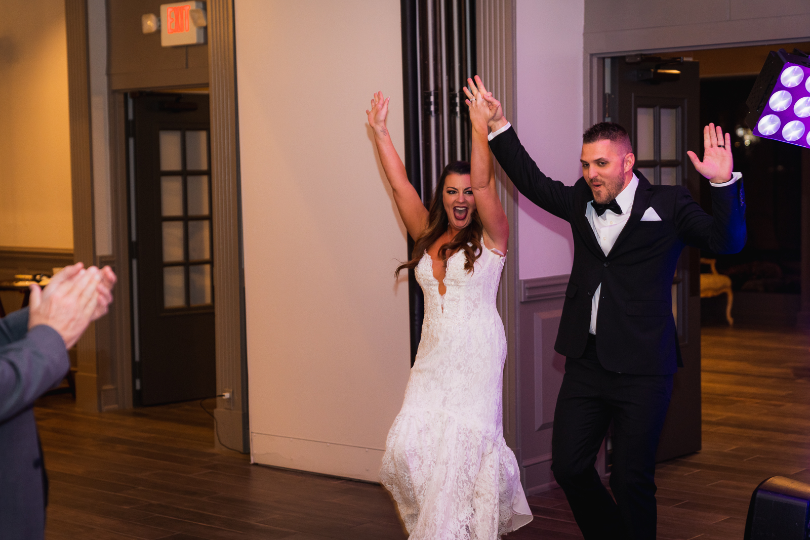 Bride and groom dance, cheer, bridal party entrance, wedding reception at Gather at the Lakes