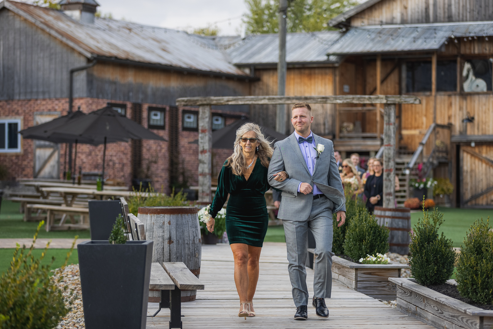 Groom and mother, wedding processional, fall wedding, rustic outdoor wedding ceremony at White Birch Barn